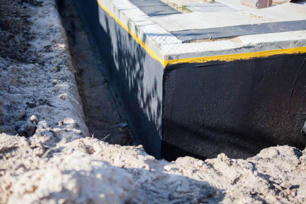 Professional Wet Basement Repair technician working in West Milton, PA